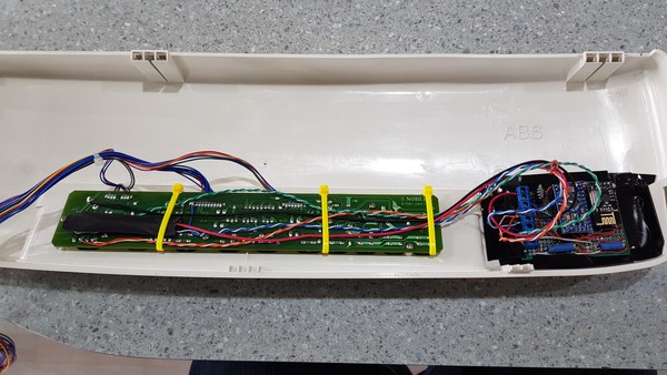 Final mounting with a 350mA fuse inside the black heatshrink on the 5V line and heatshrink over my homemade optocouplers. I’ve just used strong, double-sided trim tape to mount. It will last a while, but I’ll keep an eye on it.